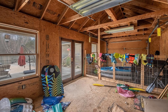 interior space with lofted ceiling and a healthy amount of sunlight