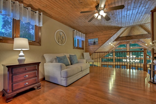 living room featuring wood ceiling, wooden walls, ceiling fan, wood-type flooring, and vaulted ceiling