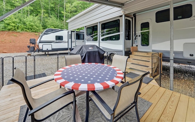 268 Getaway Holw, Hayesville, NC 28904 - wooden terrace with outdoor dining area and grilling area