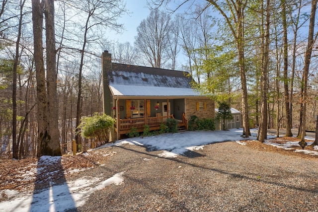 view of front of property with a garage and a porch