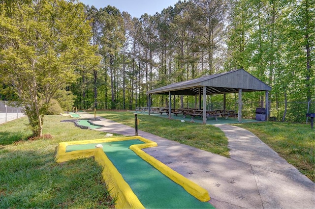 view of home's community with a gazebo and a yard