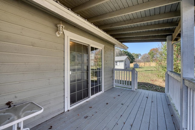deck with an outdoor structure