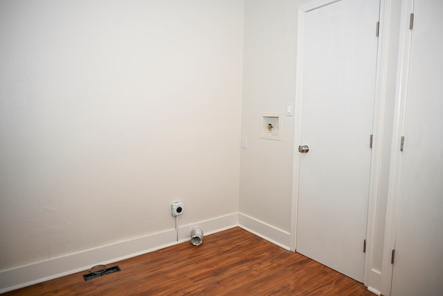 laundry area featuring washer hookup and wood-type flooring