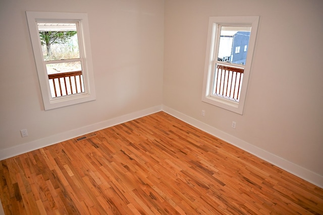 empty room featuring light hardwood / wood-style flooring