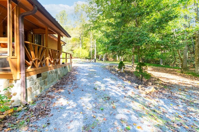 view of property exterior with driveway