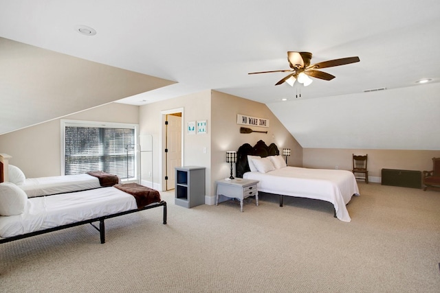 bedroom featuring a ceiling fan, baseboards, visible vents, vaulted ceiling, and light carpet