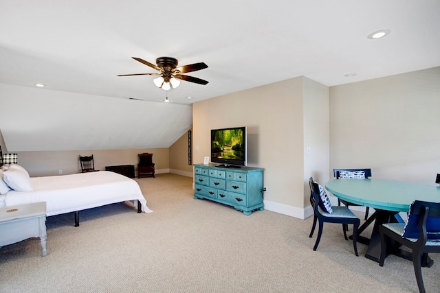 bedroom with recessed lighting, baseboards, light colored carpet, and vaulted ceiling