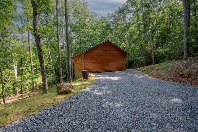 155 Stone Crest Ln, Murphy, NC 28906 - view of side of property featuring crawl space, a wooded view, and gravel driveway