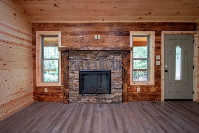 155 Stone Crest Ln, Murphy, NC 28906 - unfurnished living room featuring wooden ceiling, wood finished floors, wood walls, and a fireplace