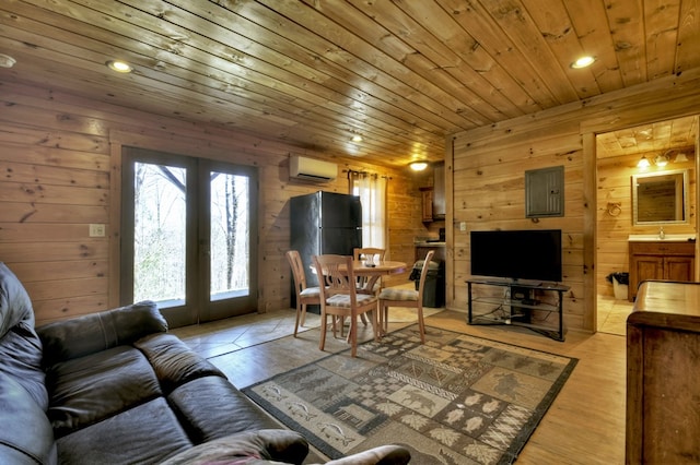 living room with wooden walls, a wall unit AC, electric panel, wooden ceiling, and french doors