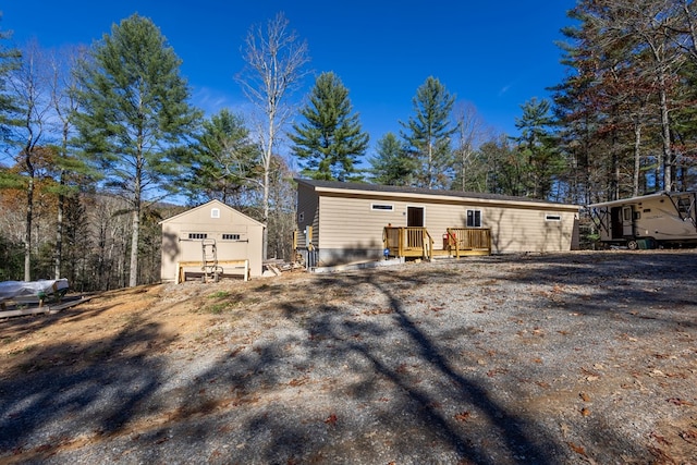 view of front of property with a wooden deck