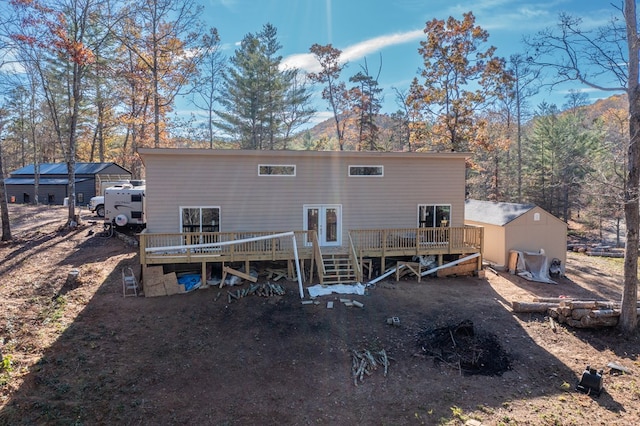 back of property featuring a deck