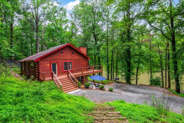 165 Timberwalk Dr, Ellijay, GA 30540 - log cabin featuring log siding, a wooden deck, and stairway