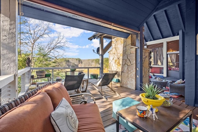 wooden deck featuring an outdoor hangout area