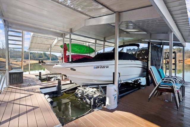 view of dock with a water view and boat lift