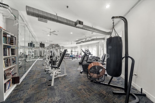 workout area with dark carpet and ceiling fan