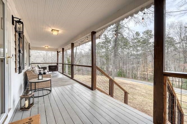 wooden deck featuring a porch