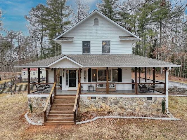 country-style home with covered porch