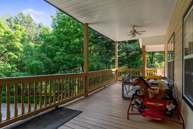 wooden deck with ceiling fan