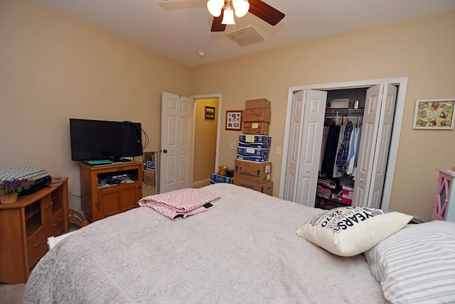 bedroom featuring ceiling fan and a closet