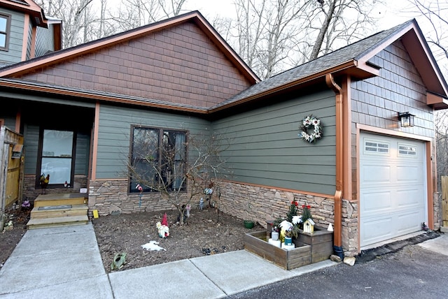 view of front of home with a garage