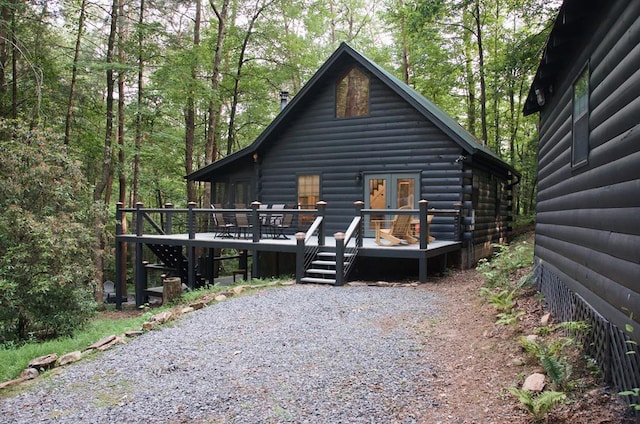 view of front of house featuring a wooden deck