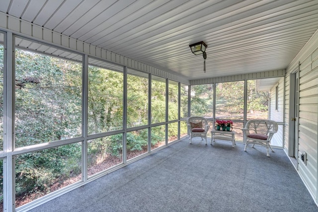 unfurnished sunroom featuring plenty of natural light