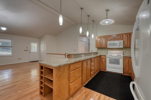 kitchen featuring light wood-type flooring, white appliances, light stone countertops, vaulted ceiling with beams, and kitchen peninsula