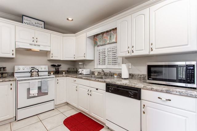 kitchen with white appliances, light tile patterned flooring, a sink, white cabinets, and under cabinet range hood