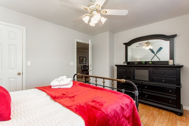 bedroom featuring light wood-style floors and ceiling fan