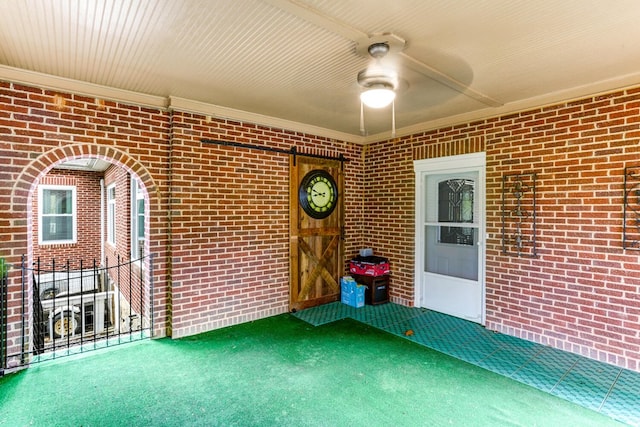 view of patio featuring ceiling fan