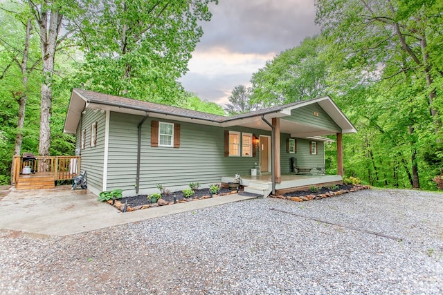68 Phillips Crk, Andrews, NC 28901 - view of front of house with covered porch and gravel driveway