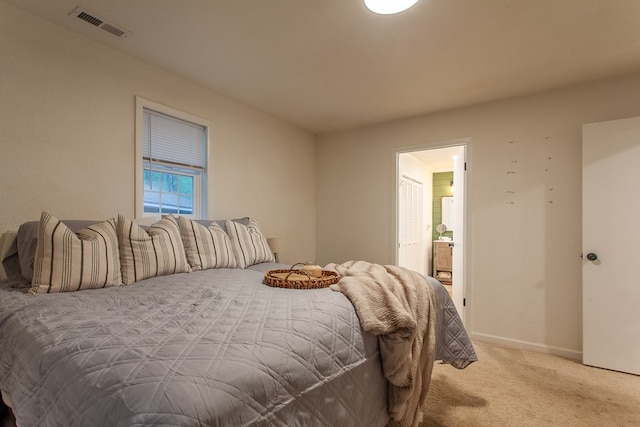 68 Phillips Crk, Andrews, NC 28901 - bedroom featuring light carpet, baseboards, and ensuite bath