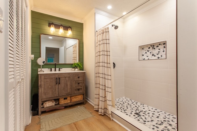 68 Phillips Crk, Andrews, NC 28901 - bathroom featuring crown molding, a stall shower, wood finished floors, and vanity