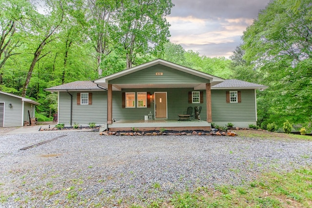 68 Phillips Crk, Andrews, NC 28901 - ranch-style home featuring gravel driveway, covered porch, and a shingled roof