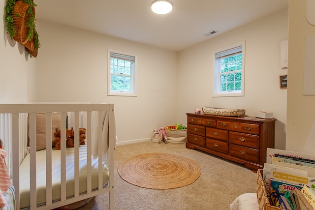 68 Phillips Crk, Andrews, NC 28901 - bedroom with carpet flooring, multiple windows, baseboards, and a nursery area