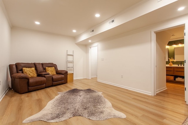 68 Phillips Crk, Andrews, NC 28901 - living area with light wood-type flooring, baseboards, recessed lighting, and ornamental molding