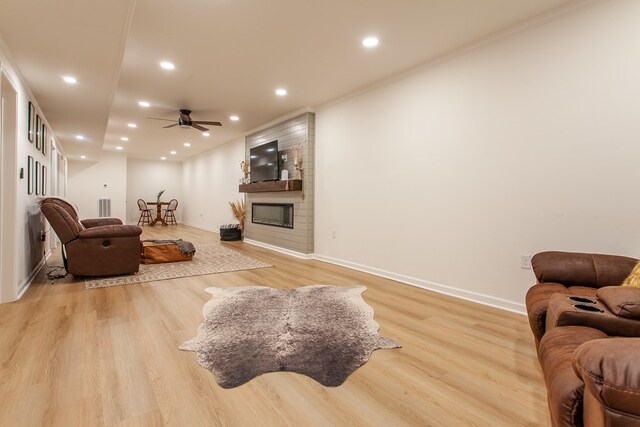 68 Phillips Crk, Andrews, NC 28901 - living room with a ceiling fan, light wood-style flooring, baseboards, a large fireplace, and recessed lighting