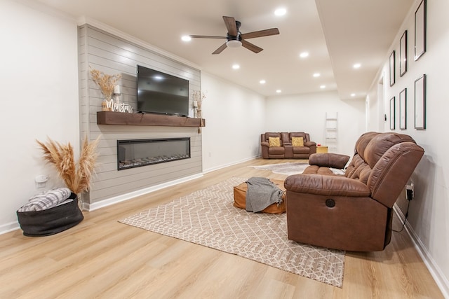 68 Phillips Crk, Andrews, NC 28901 - living area with wood finished floors, a fireplace, ceiling fan, recessed lighting, and baseboards