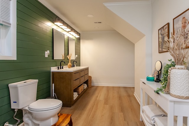 68 Phillips Crk, Andrews, NC 28901 - bathroom with wood finished floors, toilet, crown molding, vanity, and baseboards
