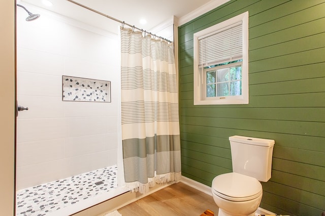 68 Phillips Crk, Andrews, NC 28901 - full bathroom with tiled shower, toilet, ornamental molding, wood finished floors, and wooden walls