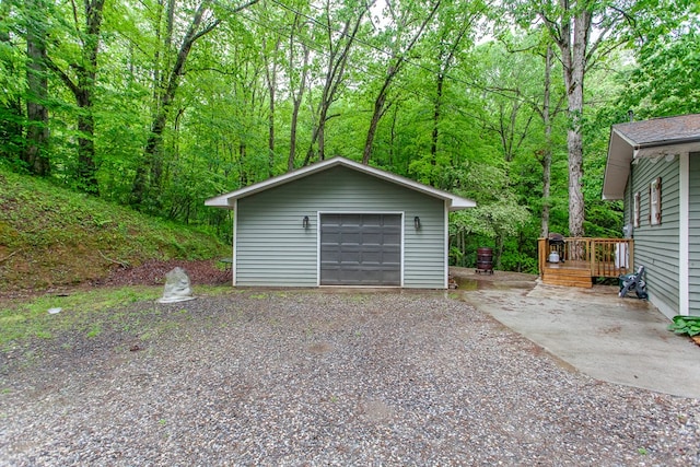 68 Phillips Crk, Andrews, NC 28901 - detached garage with driveway and a view of trees