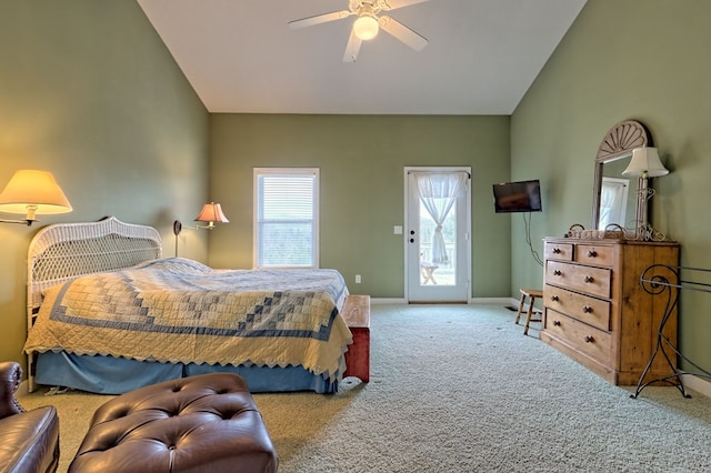 bedroom with access to exterior, ceiling fan, carpet, and vaulted ceiling