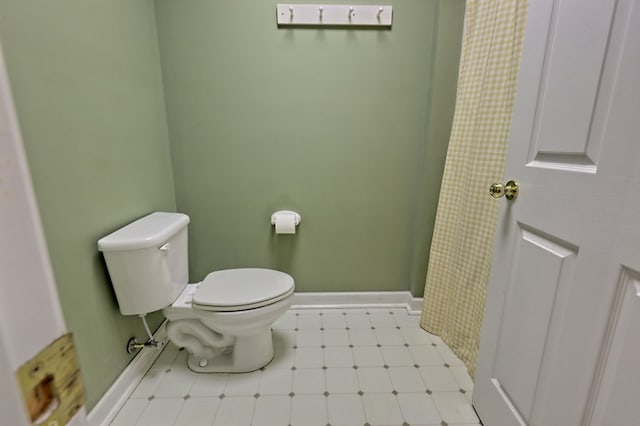 bathroom featuring toilet