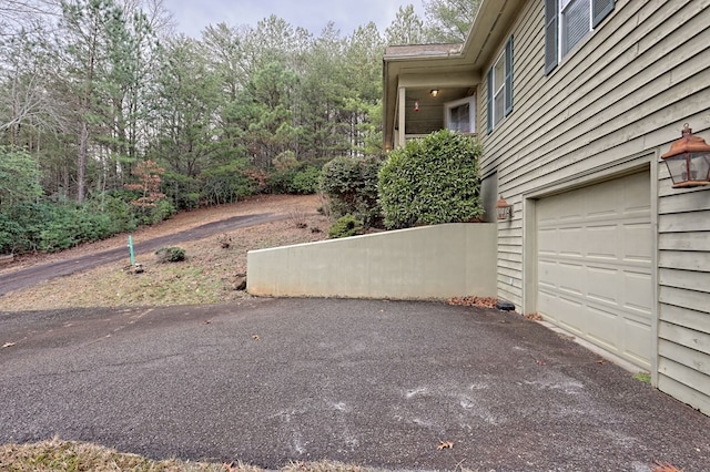 view of yard featuring a garage