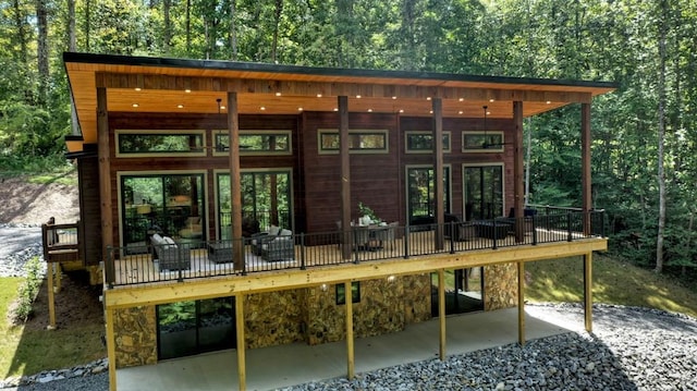 view of outbuilding with a view of trees