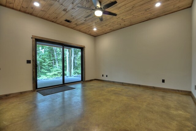 empty room featuring wooden ceiling, concrete flooring, and ceiling fan