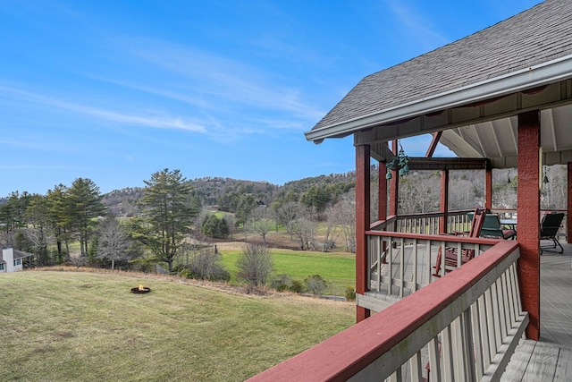 view of yard with a deck and a gazebo