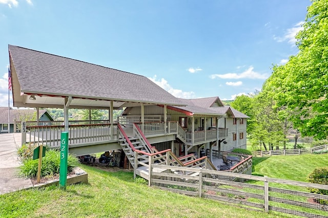623 Overlook Way, Sky Valley, GA 30537 - rear view of property with a lawn, a wooden deck, stairway, a fenced backyard, and roof with shingles