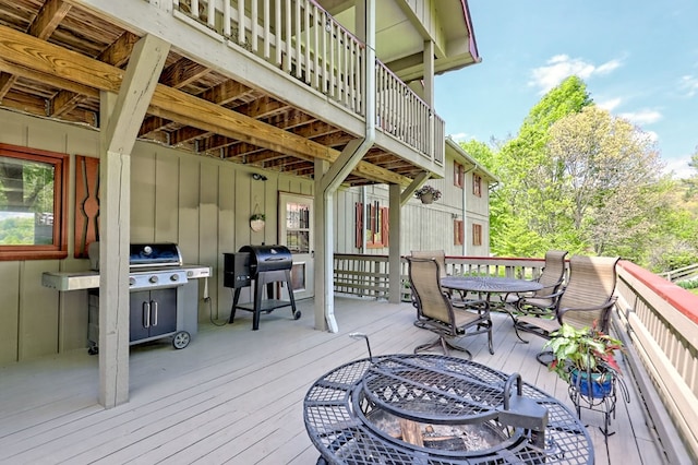 623 Overlook Way, Sky Valley, GA 30537 - wooden deck featuring grilling area and outdoor dining area